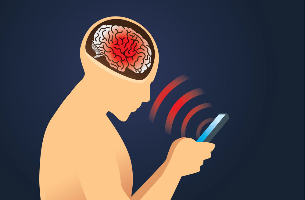 Graphic of a man looking at his phone with red waves coming from the phone, and his brain turning red